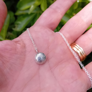 Small hollow form pendant