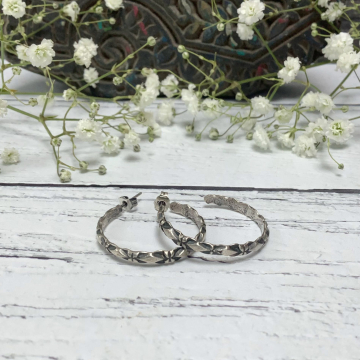 Faceted silver hoops